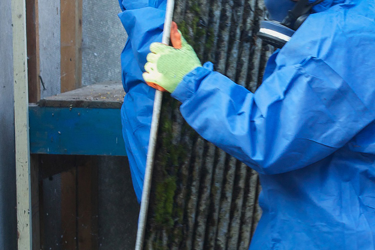 Contractor holding a piece of metal