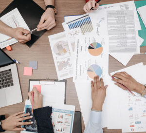 a view above charts and graphs of paperwork on a desk