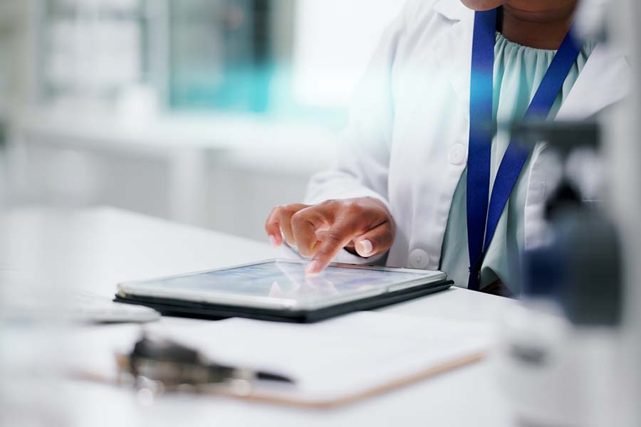 doctor using tablet