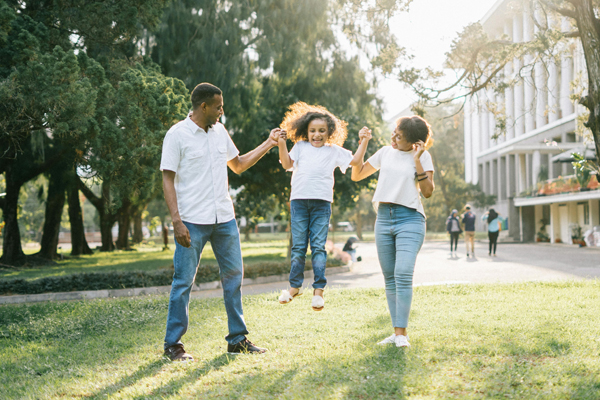 family playing on grass