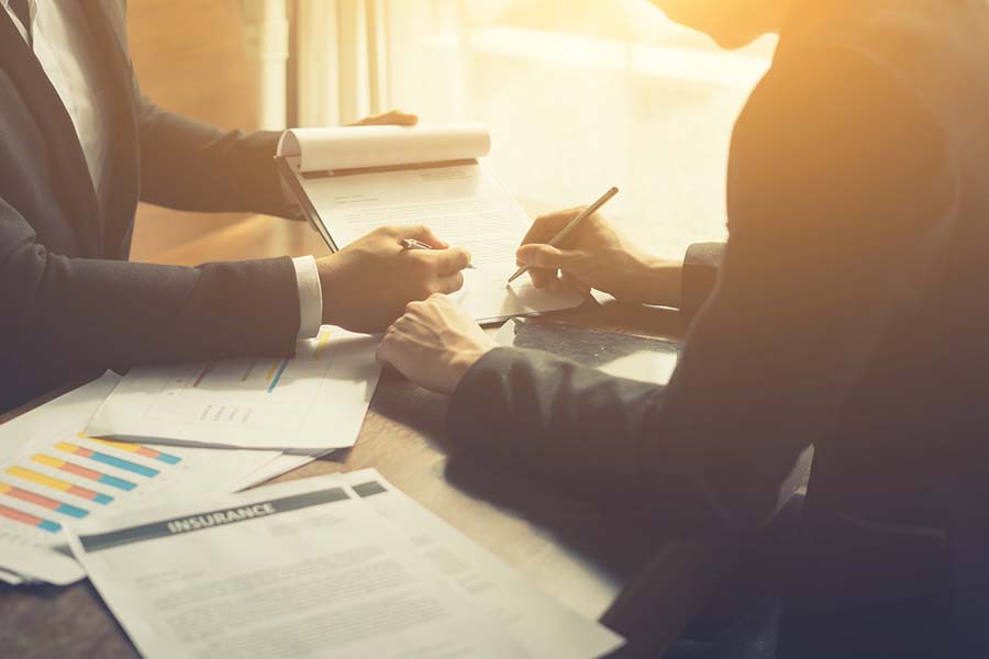 insurance paperwork on a desk