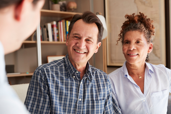 older couple meeting with financial advisor