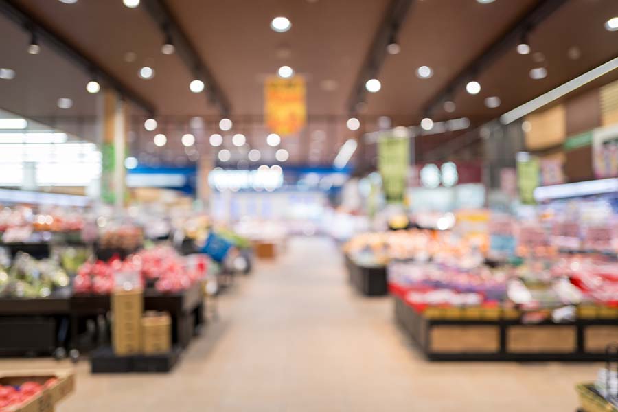 out of focus grocery produce section
