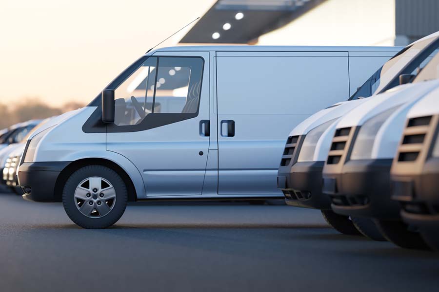 row of rental vans and trucks