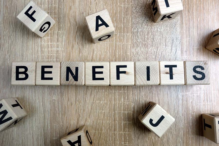 the word benefits spelled out in Scrabble